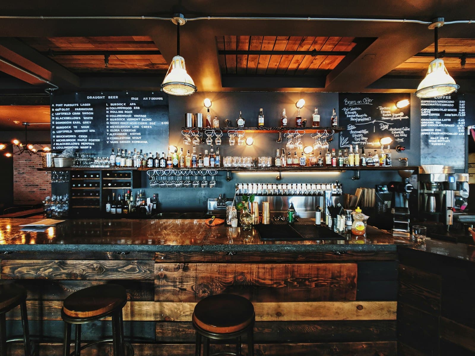 The Fifth Bar terrace at dusk with warm lighting